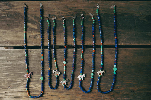 Beadstrands -- lapis lazuli and antique carved horse fetish on hand knotted silk