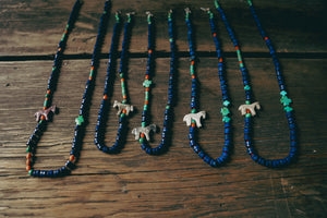 Beadstrands -- lapis lazuli and antique carved horse fetish on hand knotted silk